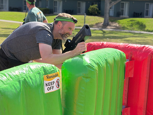 Inflatable laser tag obstacles set up on a field