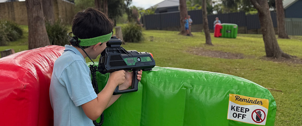 Kids playing laser tag at a birthday party in NSW