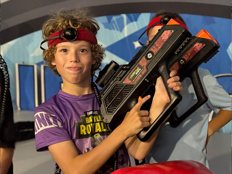 Children playing laser tag during school holiday program in NSW