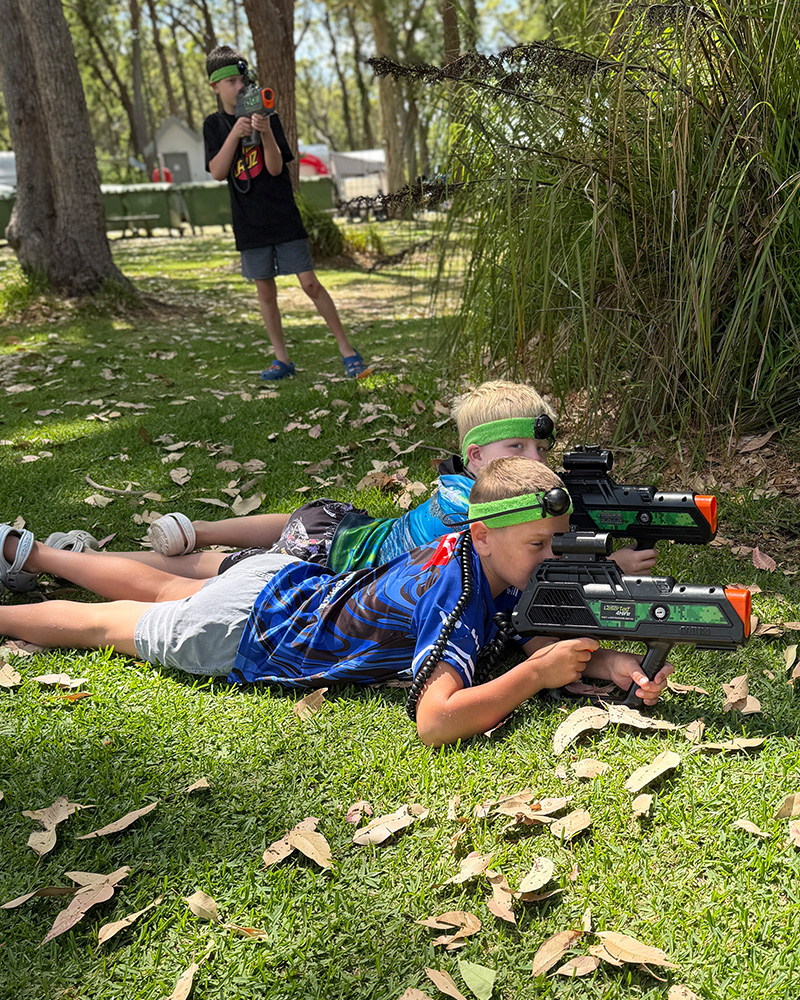Laser Tag 2 U operator running a session at an outdoor community event in NSW